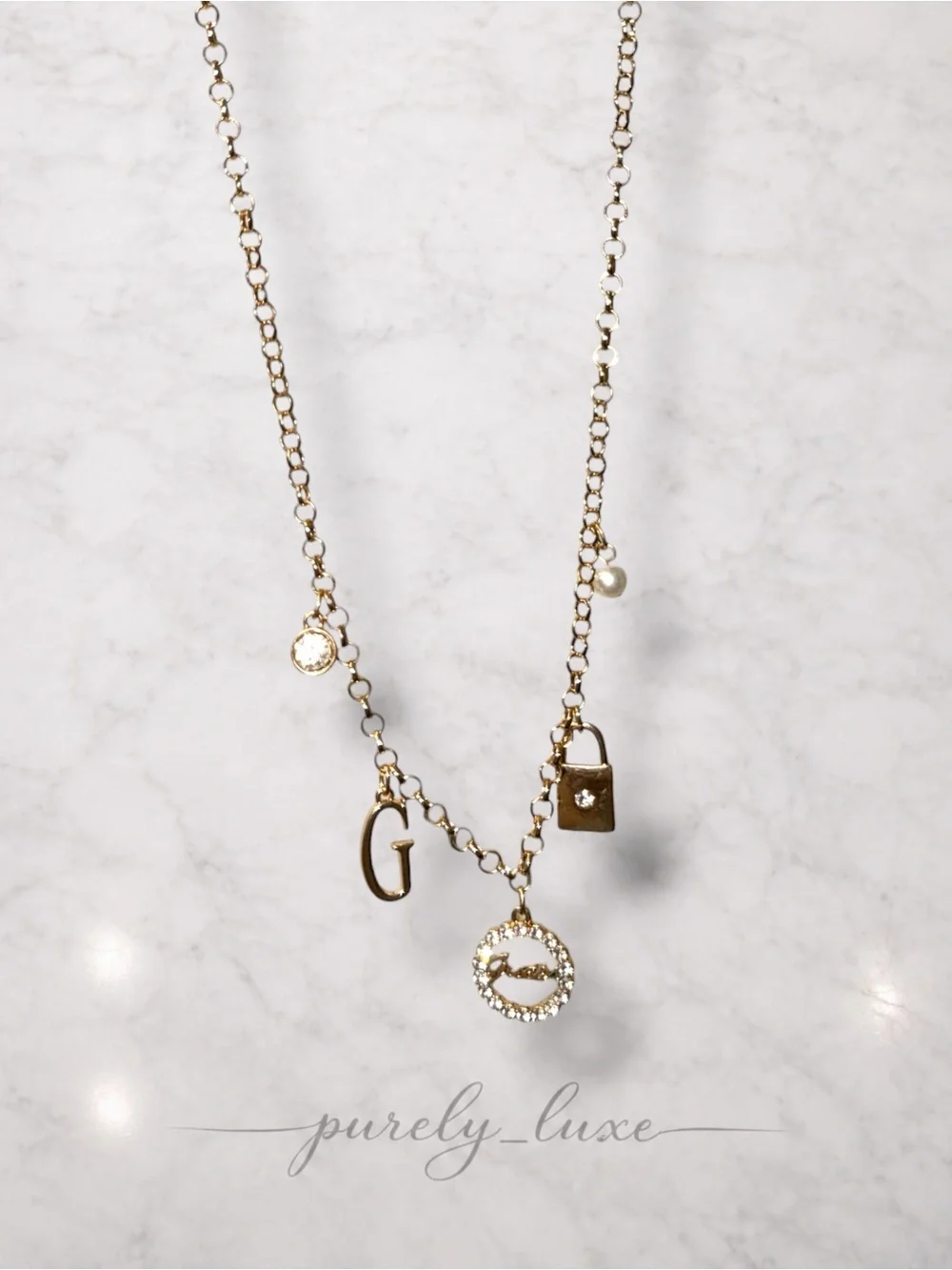 Guess Gold Charm Necklace with Crystal Accents
